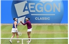 BIRMINGHAM, ENGLAND - JUNE 15:  Raquel Kops-Jones and Abigail Spears (L) of the United States celebrate during the Doubles Final during Day Seven of the Aegon Classic at Edgbaston Priory Club on June 15, 2014 in Birmingham, England.  (Photo by Tom Dulat/Getty Images)